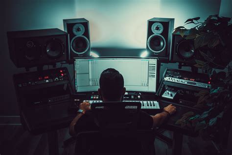 what does a producer do in music and why is it important to have a strong foundation in music theory?